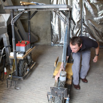 David Clark showing his vineyard buggy