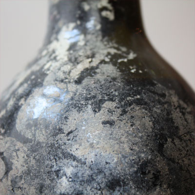 The ullage, the gap of air between cork and wine, not big for a wine of such age